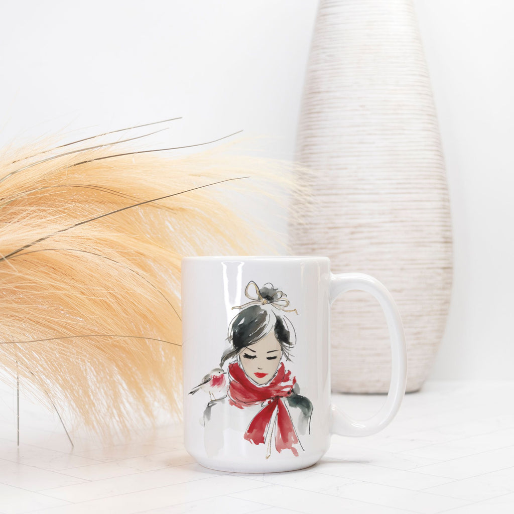 White mug with a design of a woman wearing a red scarf on a white background