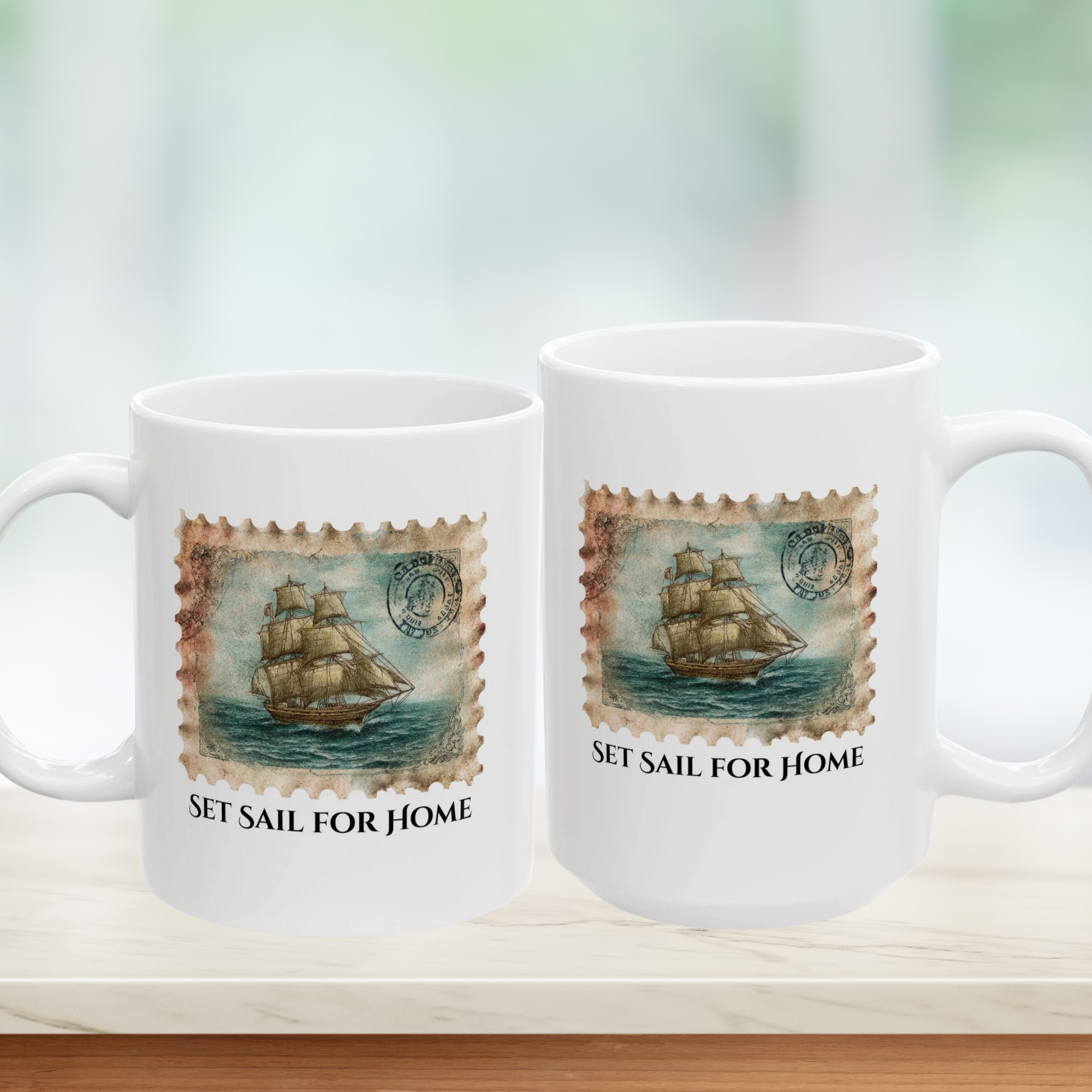 Two white mugs with ship stamp design and 'Set Sail for Home' text on a light background