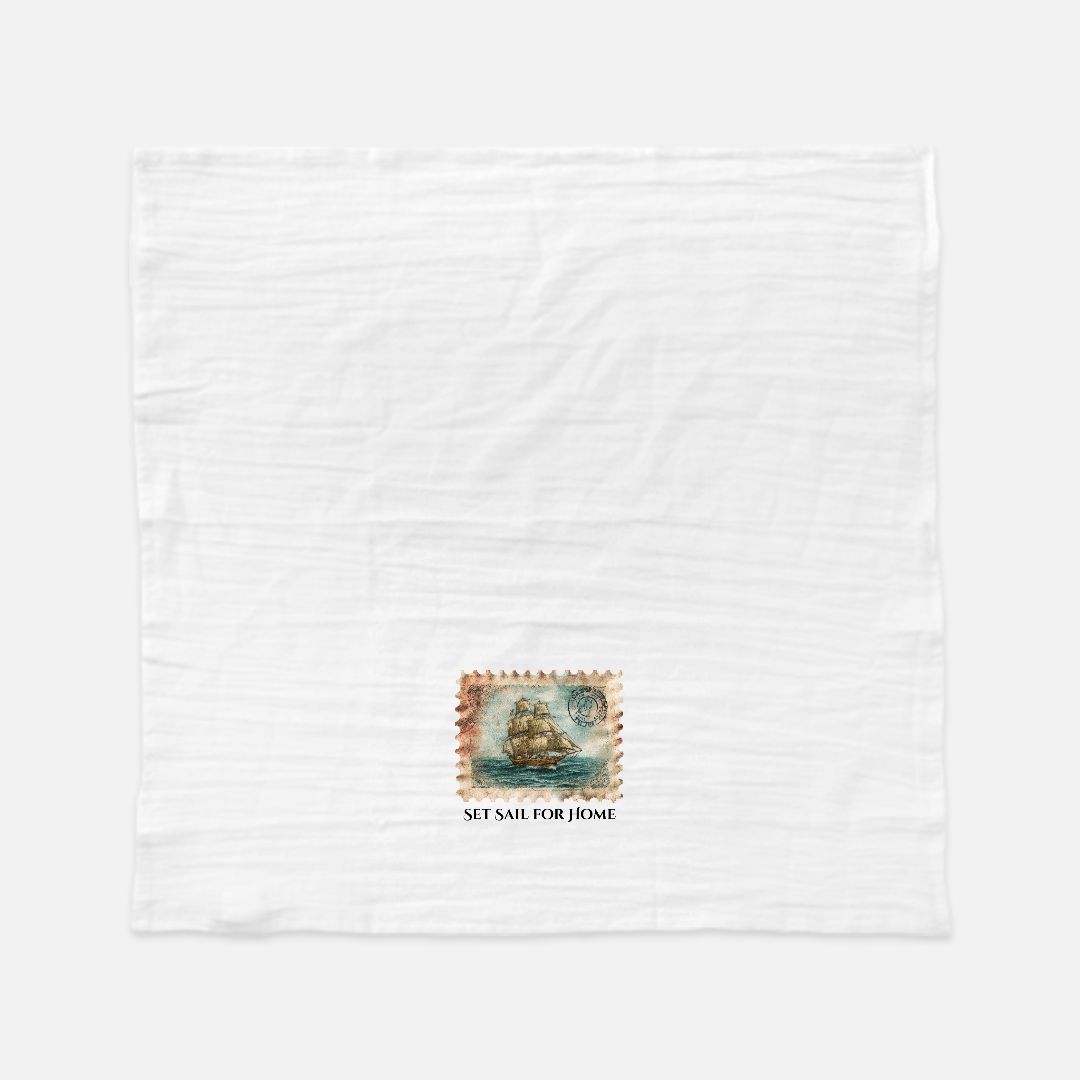 White tea towel with a vintage ship design and 'Set Sail for Home' text on a white background