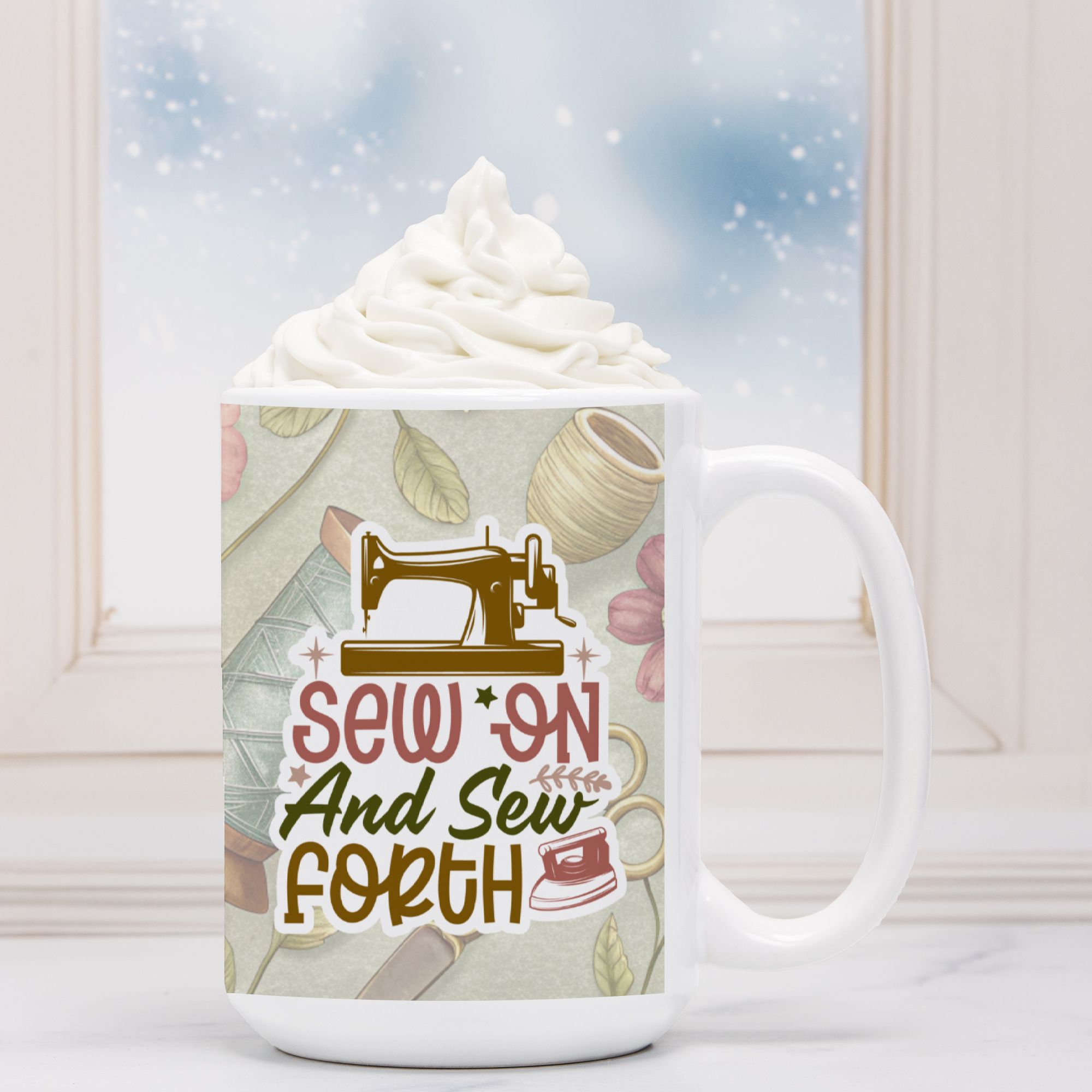 White mug with sewing-themed design and text 'Sew On And Sew Forth' against a snowy window background.