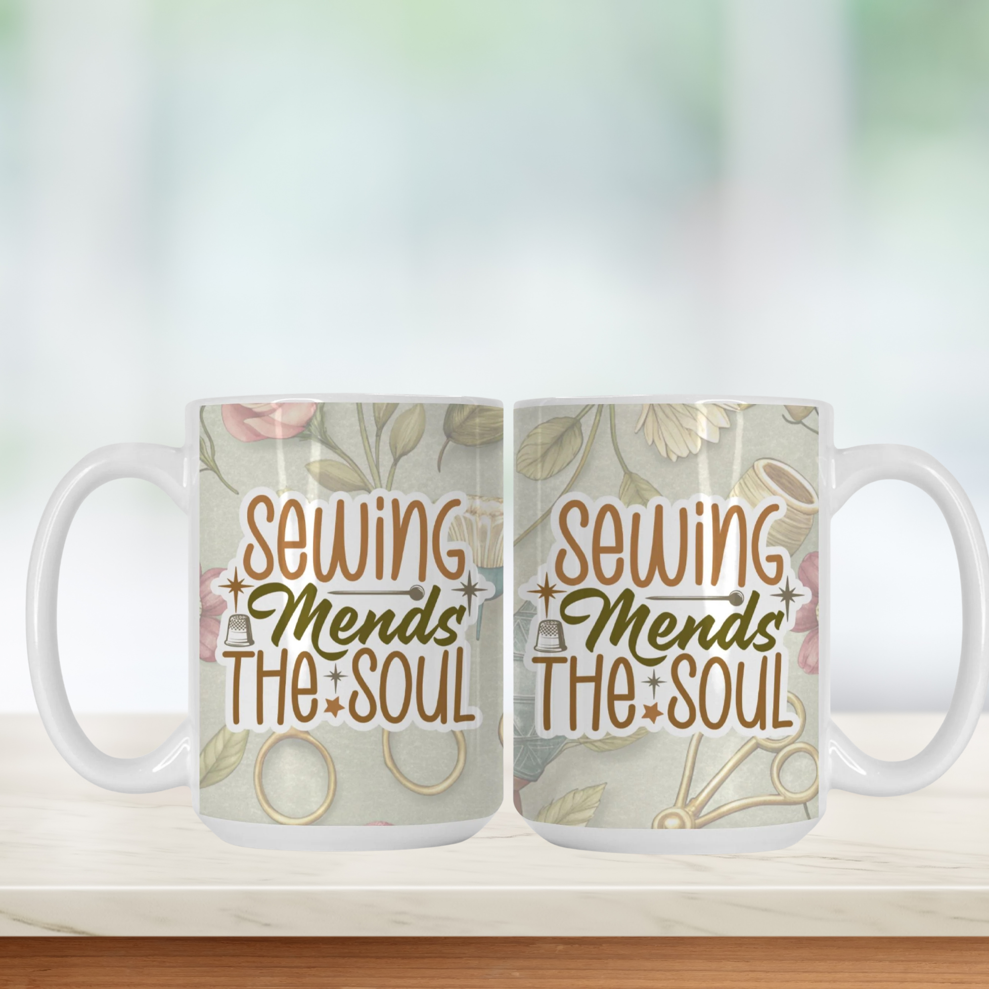 Two mugs with 'Sewing Mends The Soul' text on a floral background.