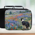 Black insulated lunch bag with a Shetland sheepdog and floral field design on a white background