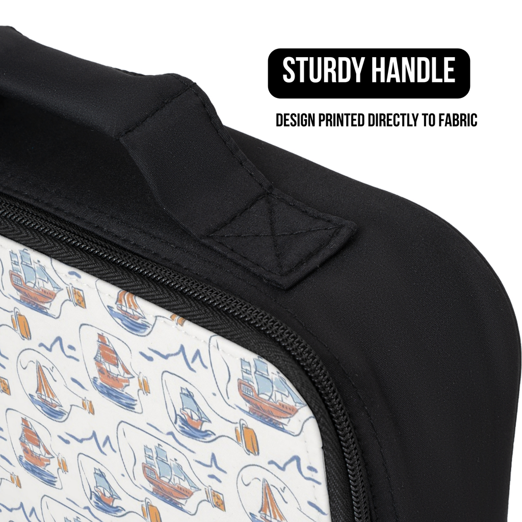 Black lunch bag with a pattern of hand drawn ships in bottles on fabric, featuring a sturdy handle.