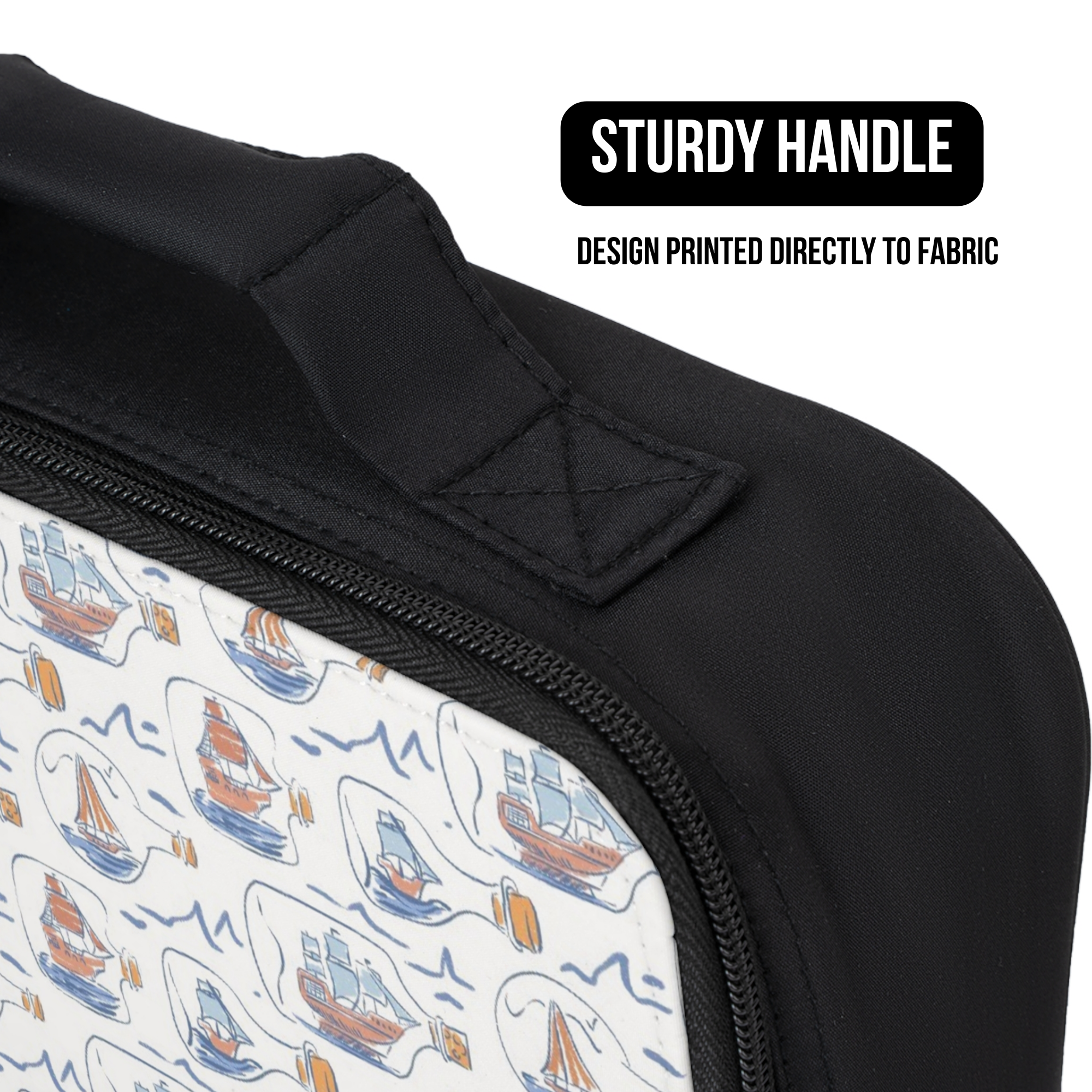 Black lunch bag with a pattern of hand drawn ships in bottles on fabric, featuring a sturdy handle.