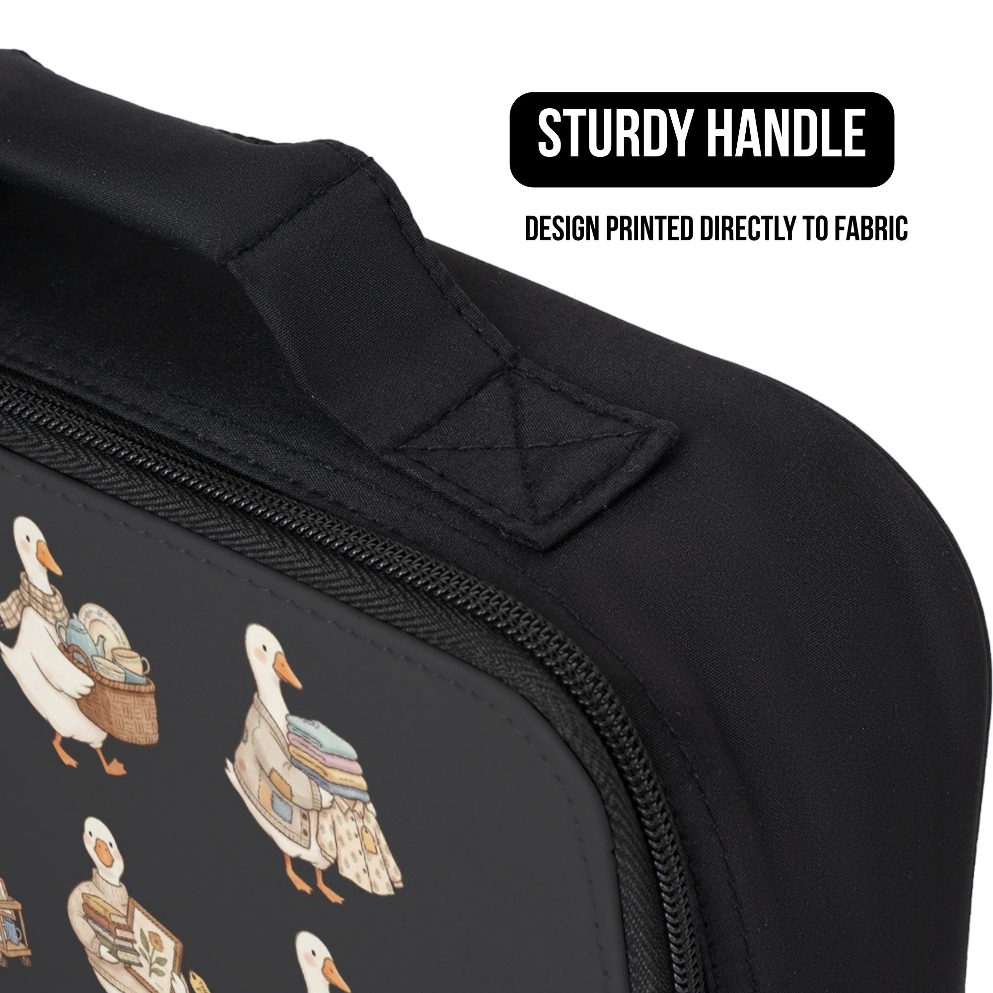 Black lunch bag with silly geese design and sturdy handle on a white background