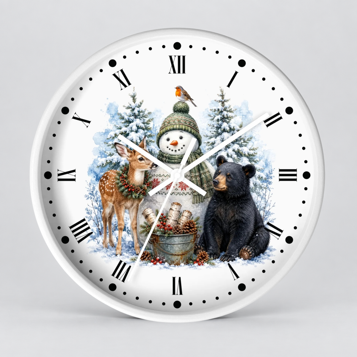 A round white wall clock with a festive winter illustration on the face, featuring a snowman in a green hat, a deer with a wreath, a black bear, snowy trees, and a small bird. The clock has black Roman numerals and black hour markers with matching black second hands, photographed against a light gray background.