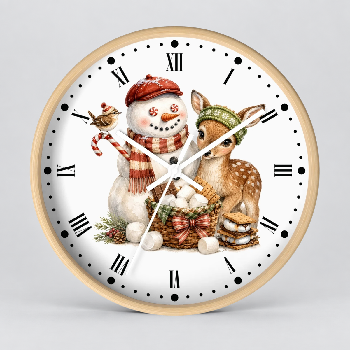 A round wall clock with a light wood frame and a white face featuring a festive illustration of a snowman and a deer with a basket of eggs, set against a neutral gray background.