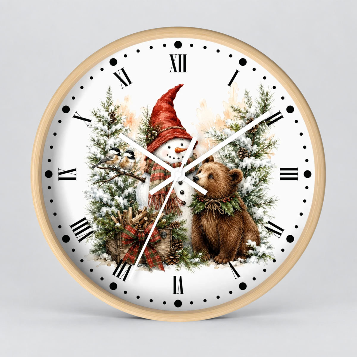 Round wall clock with a light wood frame and a white face featuring a winter holiday illustration of a snowman in a red hat, evergreen trees, pinecones, and a brown bear.