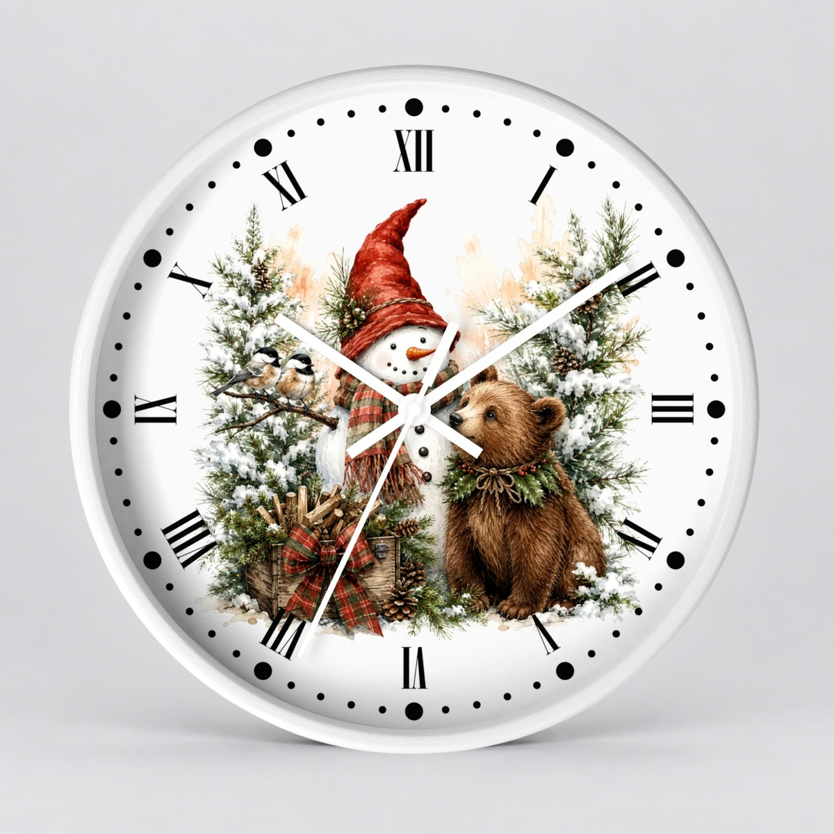 A round white wall clock with a festive winter illustration featuring a snowman in a red hat, a brown bear, pine trees, and black Roman numerals on a light gray background.
