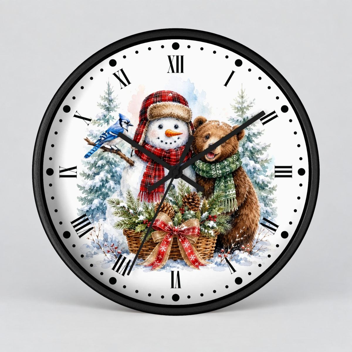 A round wall clock with a black frame and a festive winter illustration on the dial. The design shows a snowman in a red plaid scarf and hat beside a brown bear wearing a green scarf, with a blue bird and snowy trees in the background.