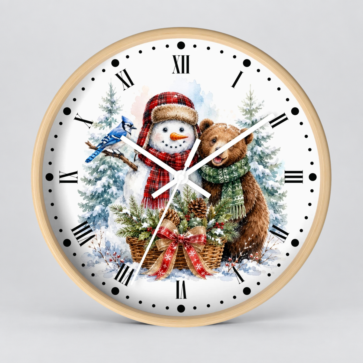 A round wall clock with a light wood frame and a white face featuring a winter holiday illustration of a snowman, a bear, a bluebird, and snowy trees. The clock uses black Roman numerals for hours and has white hands.