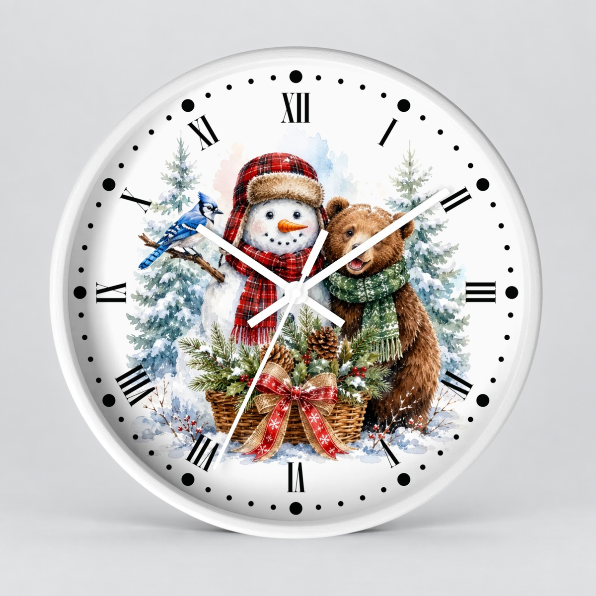 A round white wall clock with a festive winter illustration on the face, featuring a snowman in a red plaid hat and scarf, a brown bear in a green scarf, evergreen trees, a blue bird, and Roman numeral hour markers.