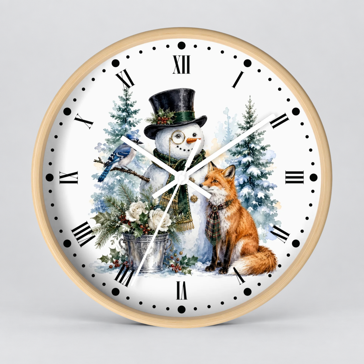 A round wall clock with a light wood frame and a white face, featuring a winter illustration of a snowman in a top hat, a bluebird, a fox, evergreen trees, and black Roman numerals. The clock is centered against a neutral light gray background.