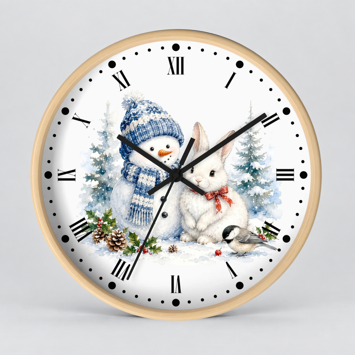 A round wall clock with a light wood frame and a white face featuring a winter holiday illustration of a snowman, a white rabbit, snowy trees, pinecones, and a small bird. The clock has black Roman numerals and black hands, photographed against a neutral light gray background.