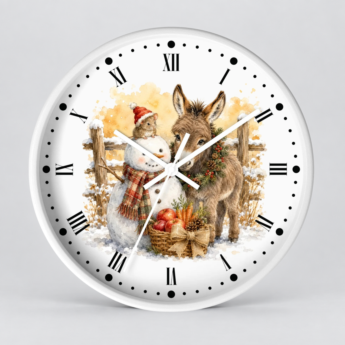 A round white wall clock with black Roman numerals and hands, featuring a festive winter illustration on the face of a snowman and a donkey in a snowy scene.