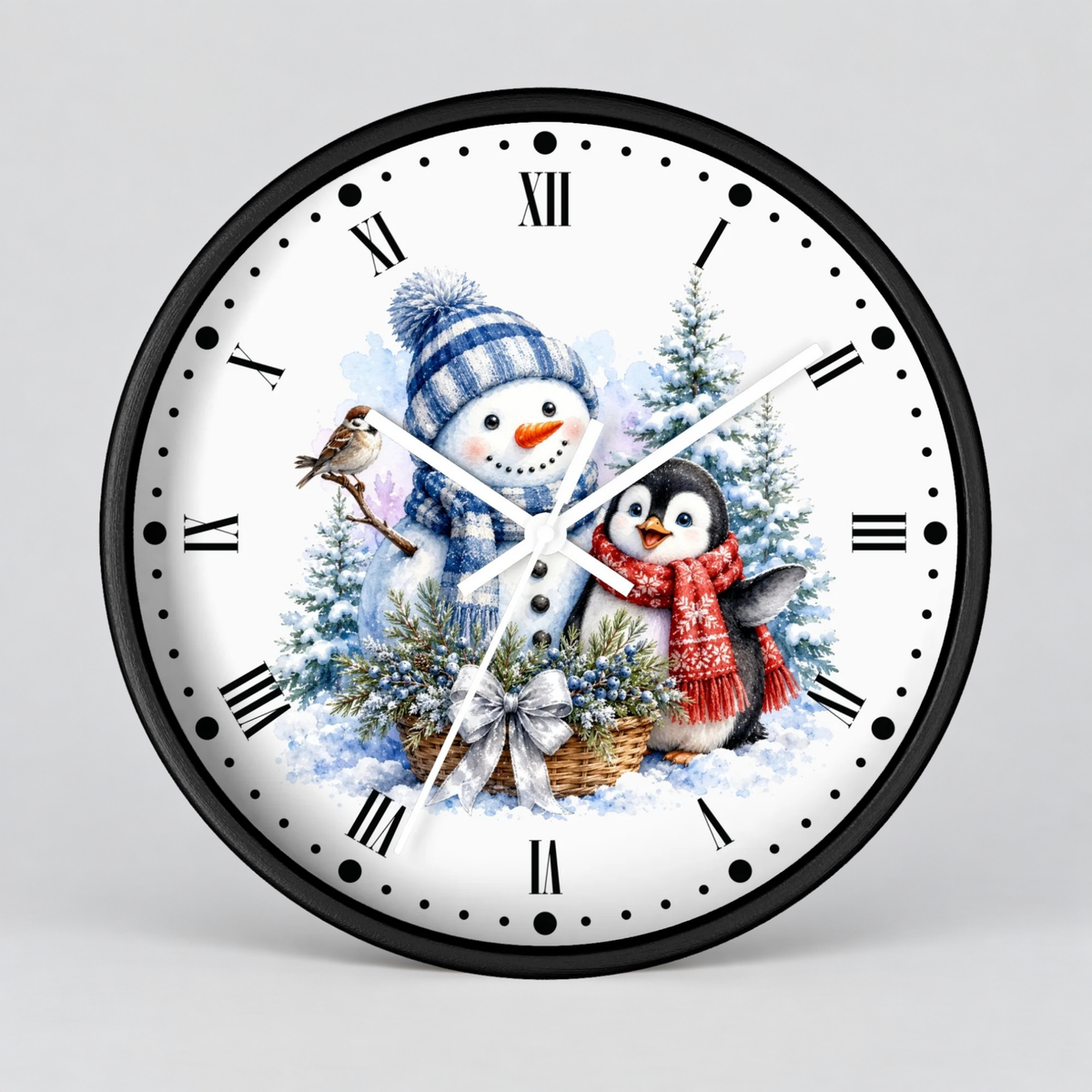 A round wall clock with a black frame and a white face featuring a winter holiday illustration of a snowman, a penguin, evergreen trees, and Roman numerals.