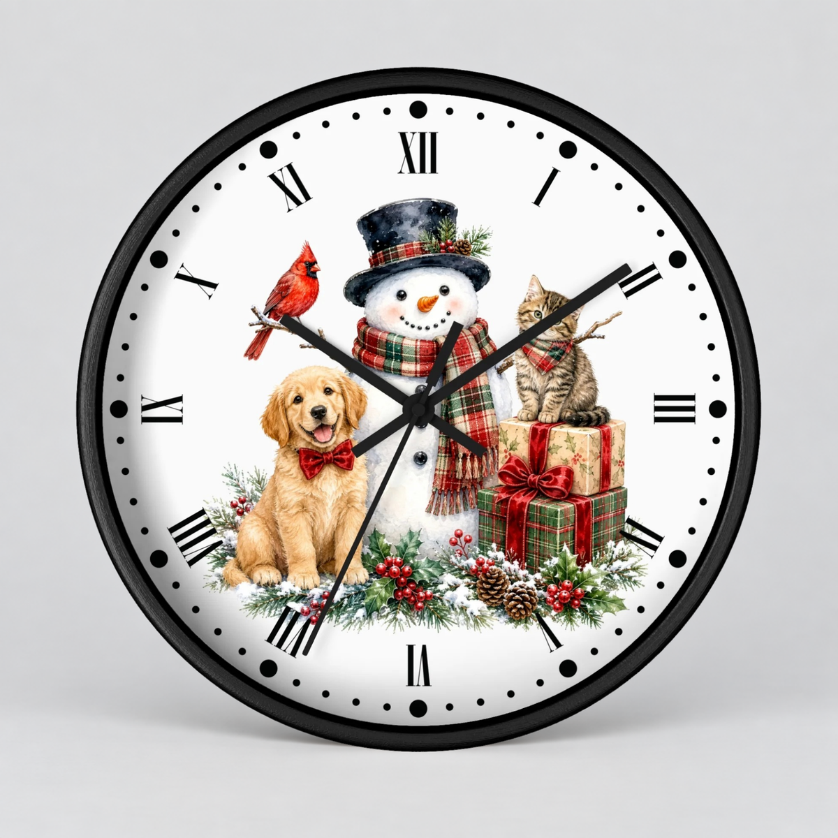 A round wall clock with a black frame and white face, featuring a festive Christmas illustration with a snowman, golden retriever dog, red cardinal, tabby cat, gift boxes, and holiday greenery. The clock is shown against a neutral light gray background.