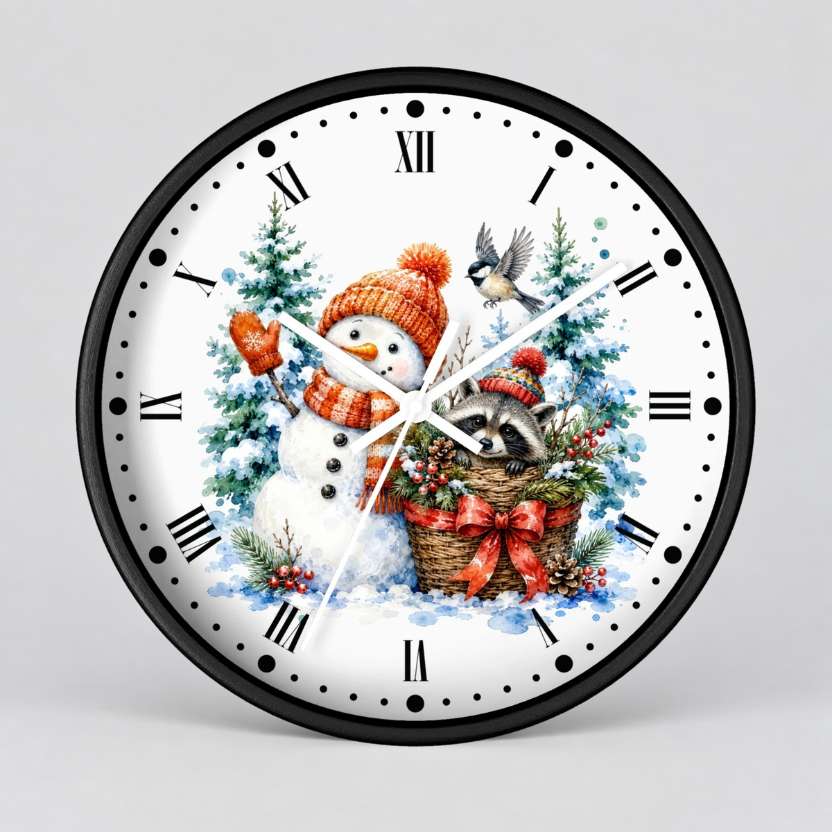 A round wall clock with a black frame and a white face featuring a winter holiday illustration of a snowman in an orange hat and scarf, a raccoon in a basket, evergreen trees, and a bird, with black Roman numerals and black hands on a light gray background.