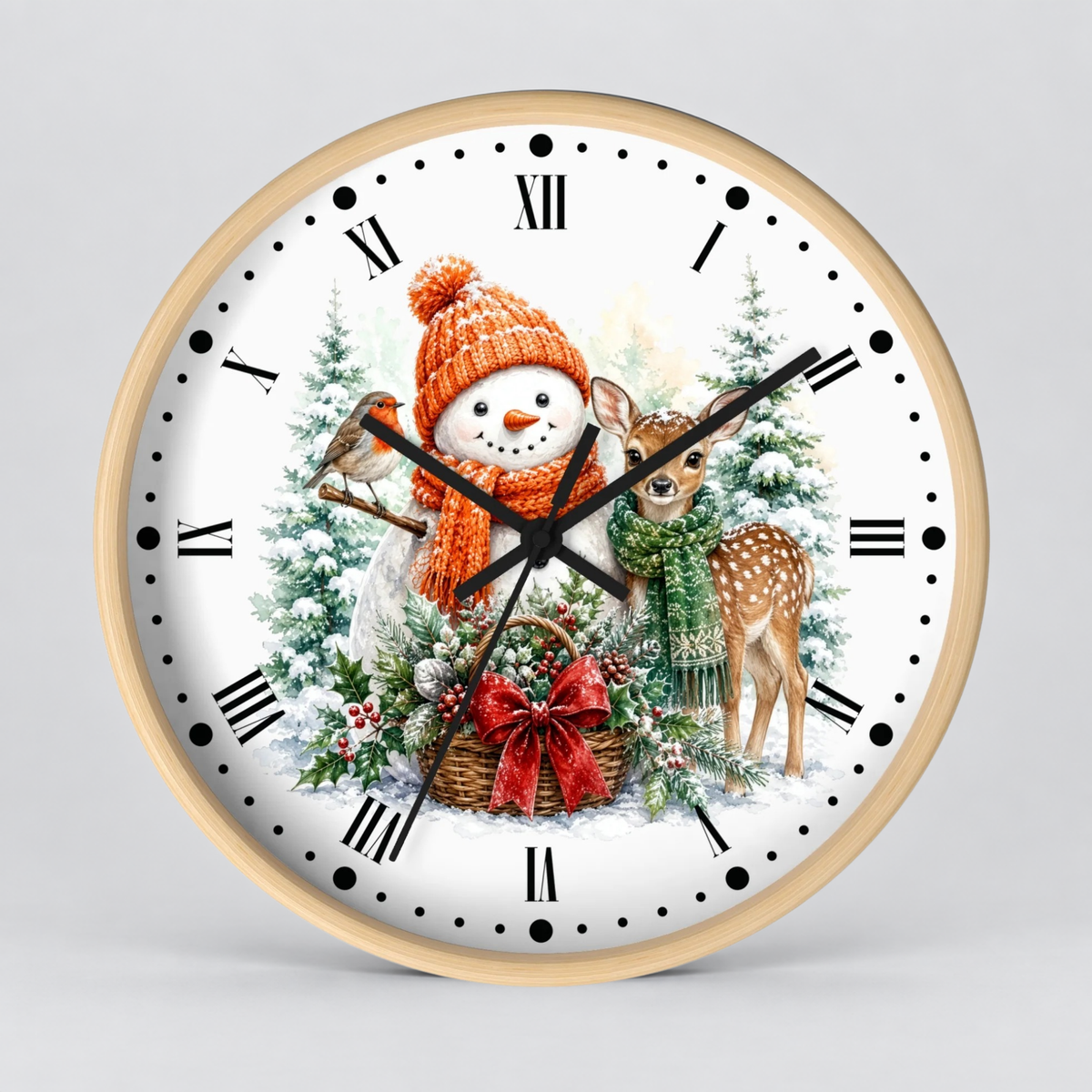 A round wall clock with a light wood frame and a white face featuring a festive Christmas illustration. The design includes a snowman in an orange knit hat and scarf, a robin, a deer, snowy trees, and a basket with a red bow.