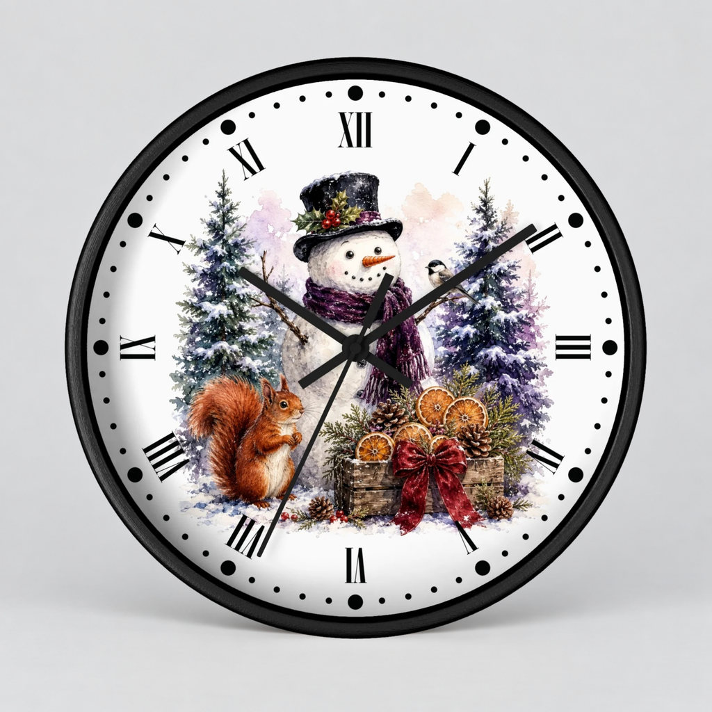A round wall clock with a black frame and Roman numerals, featuring a festive winter illustration on the white face with a snowman, a squirrel, evergreen trees, and orange decorations.
