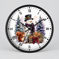 A round wall clock with a black frame and Roman numerals, featuring a festive winter illustration on the white face with a snowman, a squirrel, evergreen trees, and orange decorations.