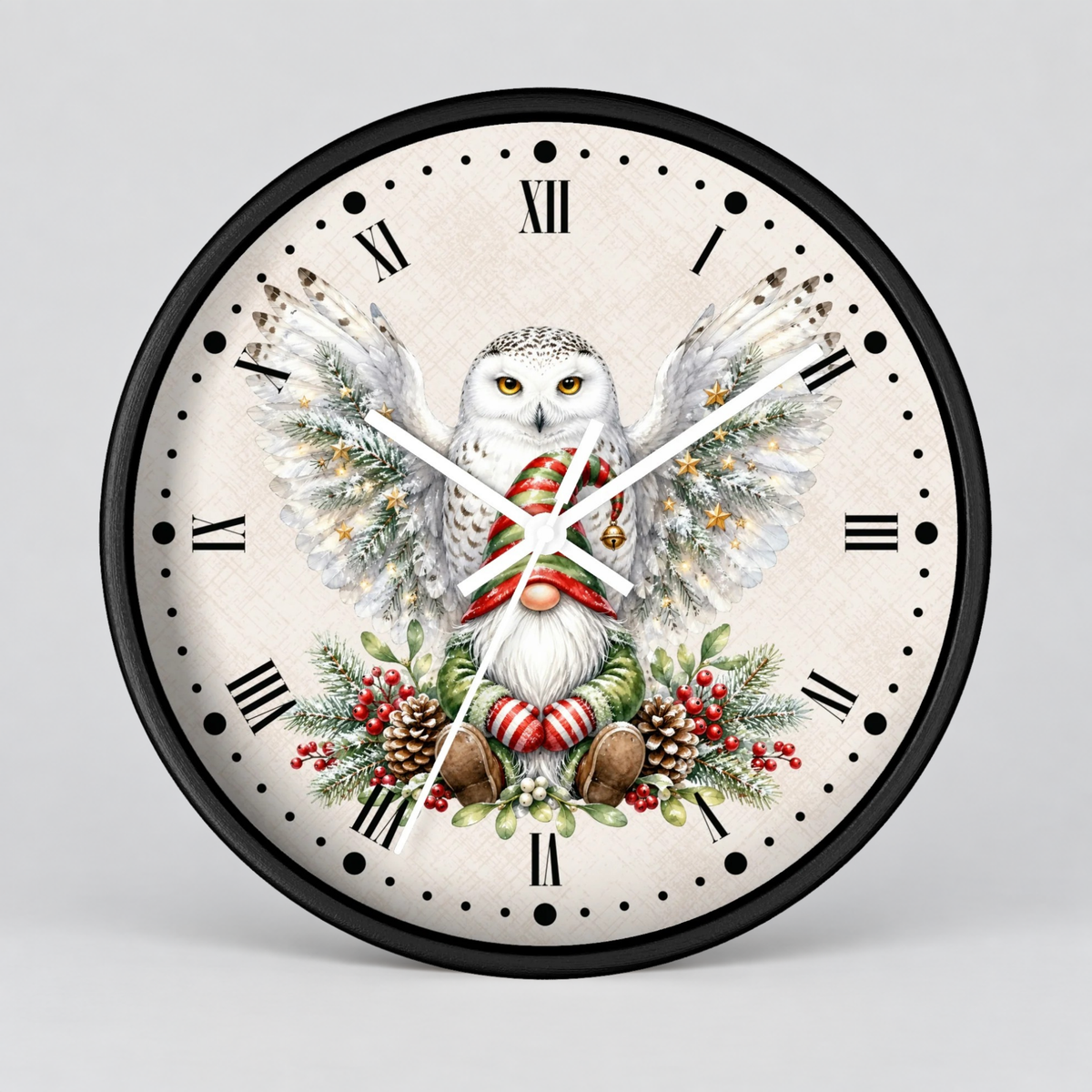 A round wall clock with a black frame and a festive printed face showing a white owl with wings spread, holding a red-and-green striped scarf, surrounded by pine branches, berries, and pinecones on a light cream background.
