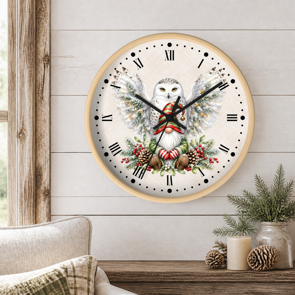 A round wall clock with a light wood frame hangs on a white shiplap wall above a rustic table. The clock face features a detailed illustration of a white owl with large wings, holding a red-and-white striped candy cane, surrounded by evergreen branches, red berries, and pinecones.