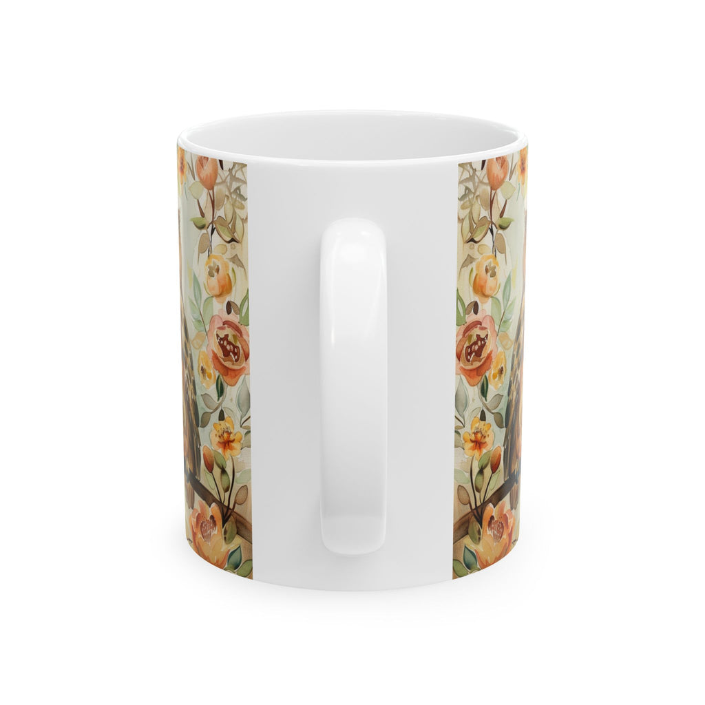 Back side of 11oz white mug with floral pattern on a white background