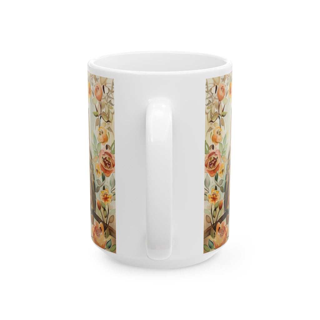 Back side of 15 oz white mug with floral pattern on a white background