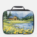  insulated lunch bag with a scenic design of a cabin and mountains on a white background.