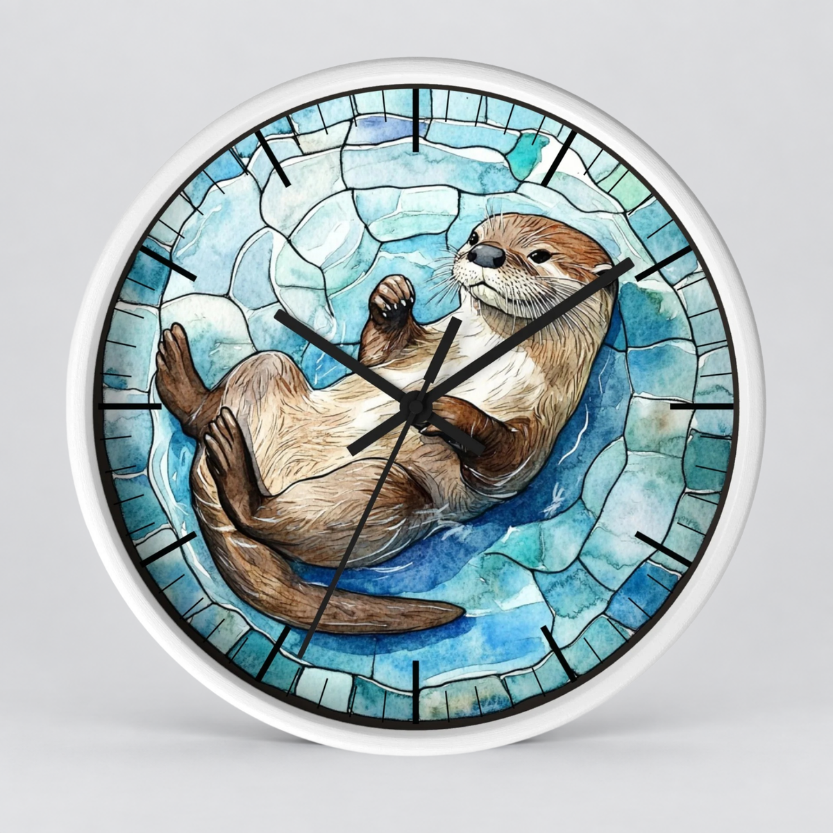 Round wall clock with a white frame and a stained-glass-style illustration of an otter floating on blue water, shown against a light gray background.