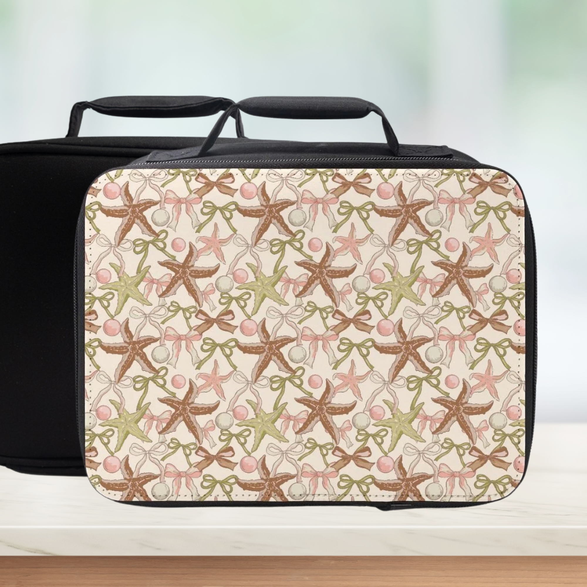 Travel bag with starfish and bow pattern on a white background
