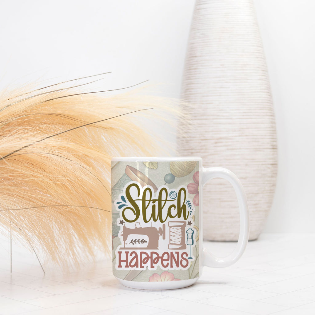 Mug with 'Stitch Happens' text and sewing-themed design on a white surface.