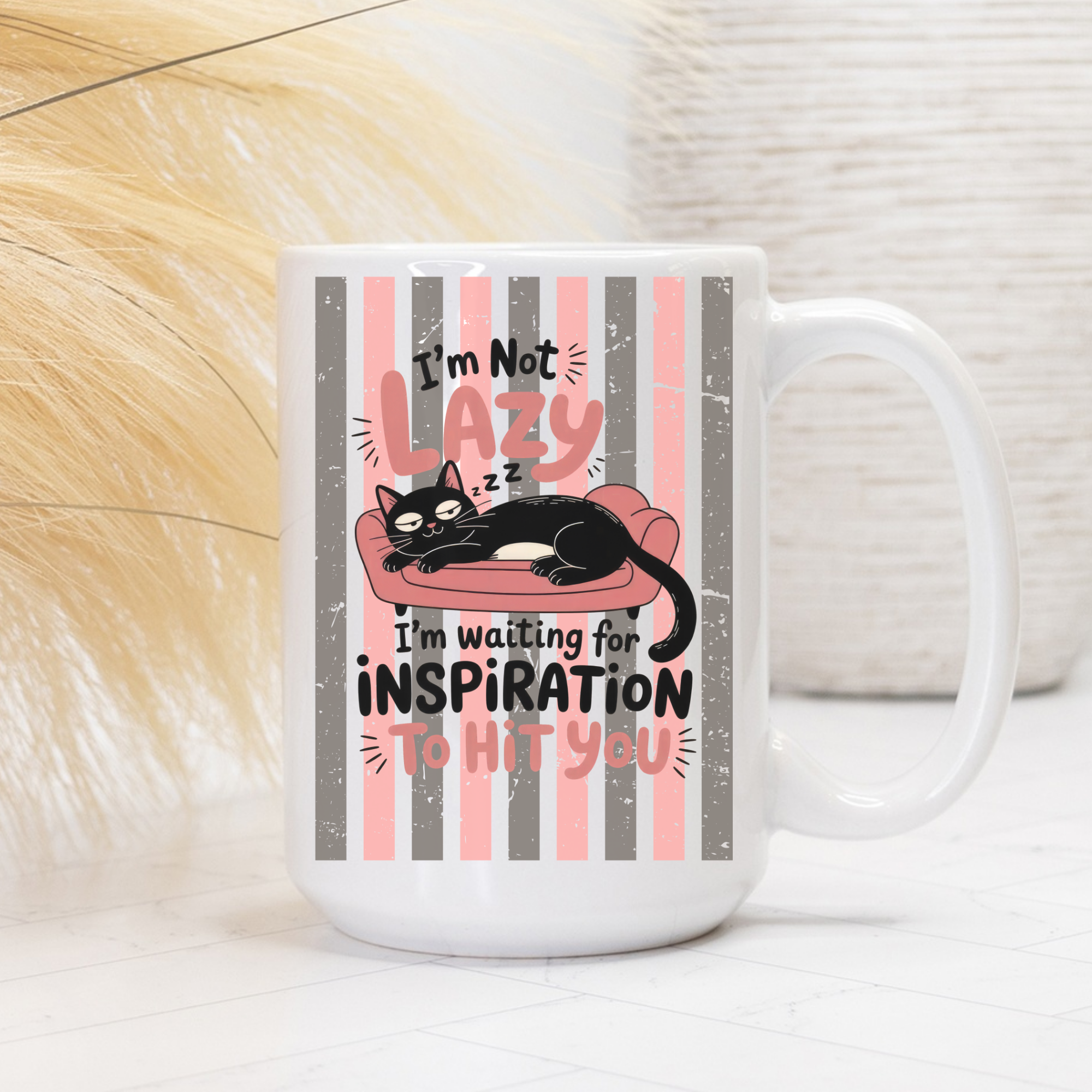 White 15oz mug with a cat graphic and text on a striped background
