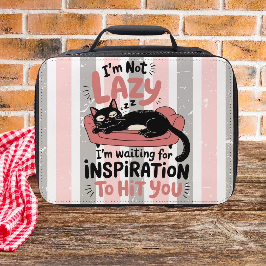 Lunch bag with a cat design and text on a wooden picnic table and a brick wall background