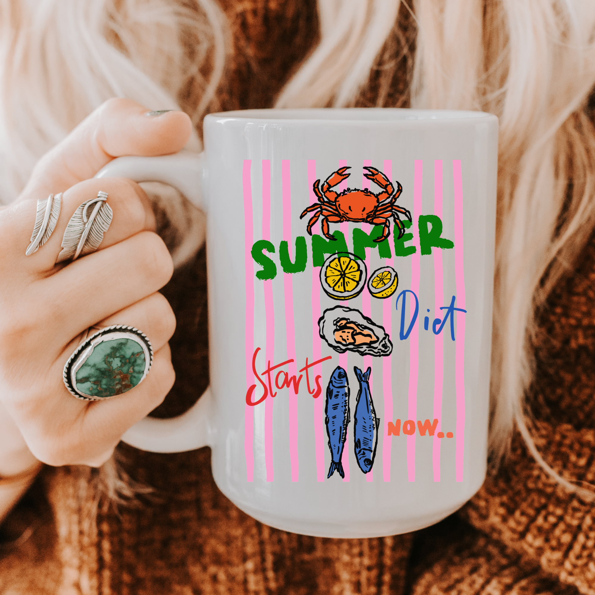 15oz. Mug with 'Summer Diet Starts Now' design held by a person wearing rings. 