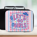 Black lunch box with 'Let's Go Girls' design featuring cowboy hats and a rope on a pink and blue striped background.