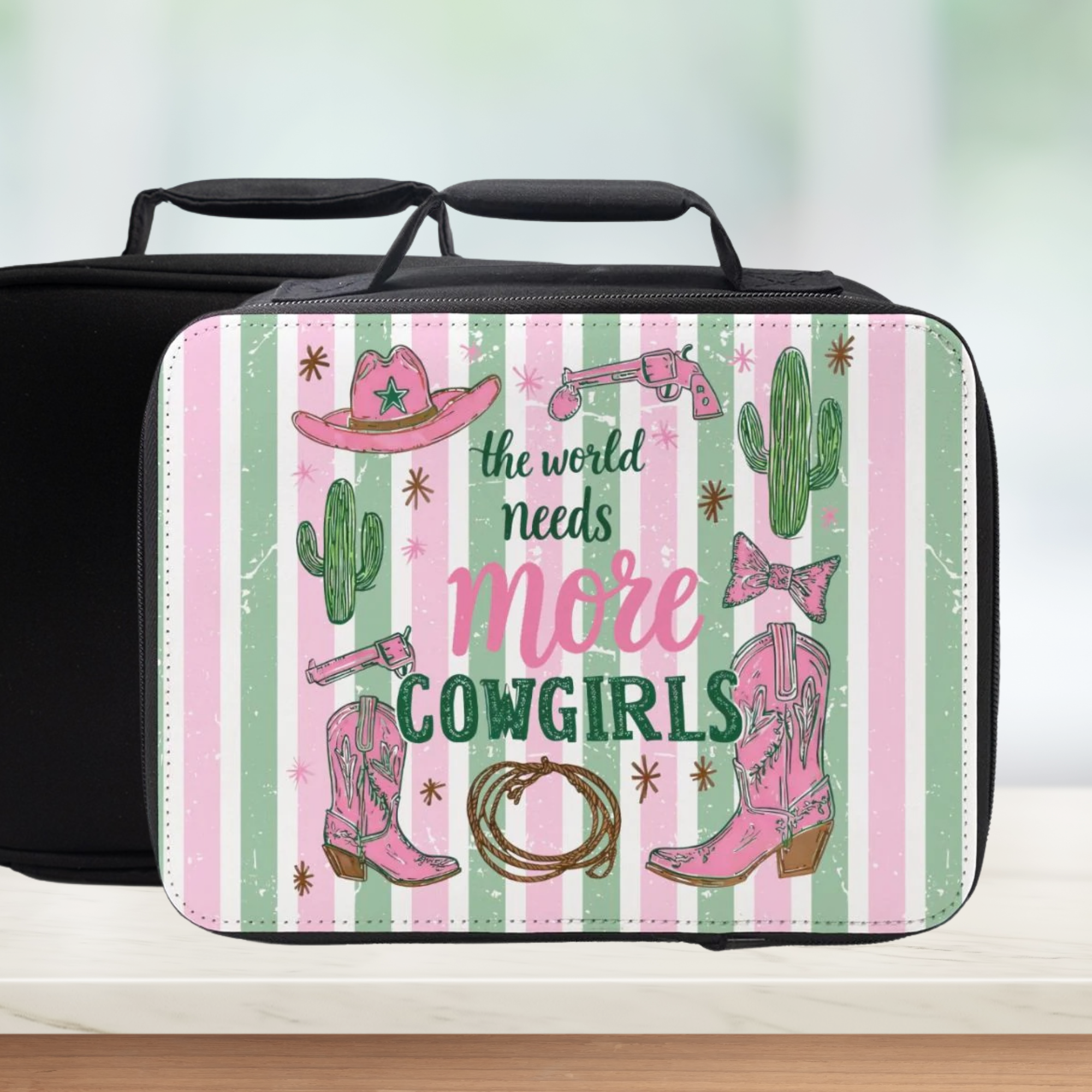 Lunch bag with pink and green striped cowgirl design and text on a striped background