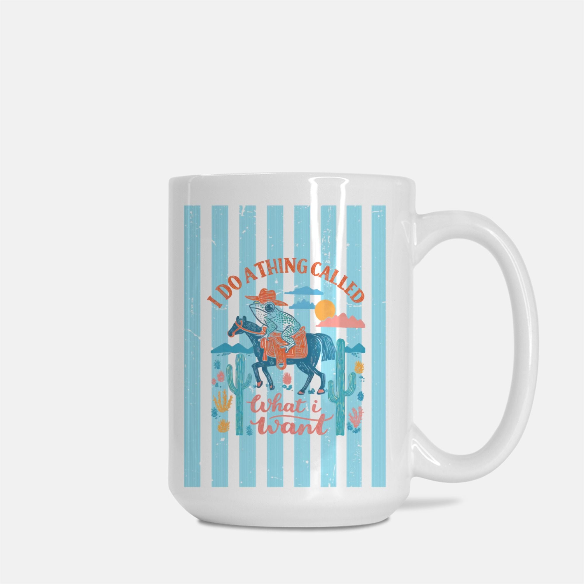 Mug with a design of a person riding a horse, cacti, and text on a white background