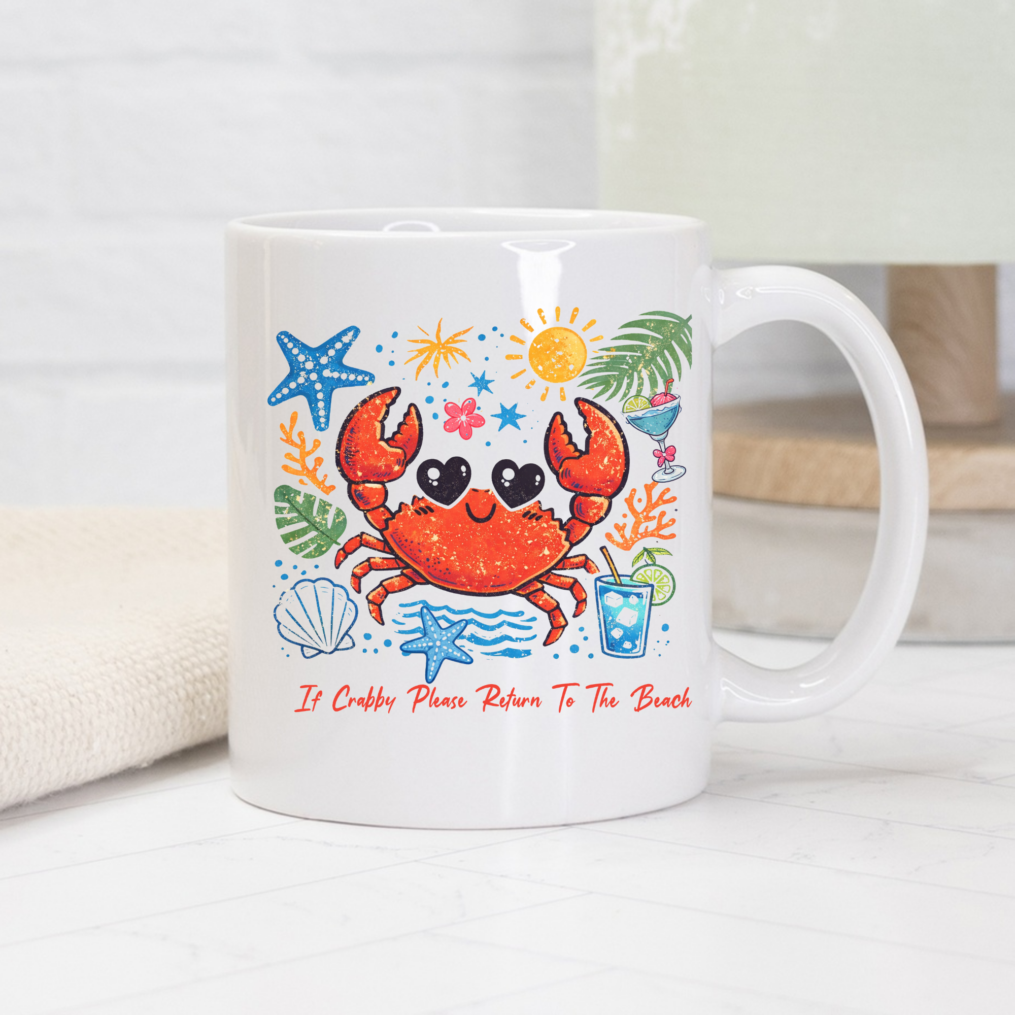 White 11oz mug with a colorful crab design and text on a white surface.
