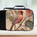 Black lunch box with a red cardinal and floral design on a white background