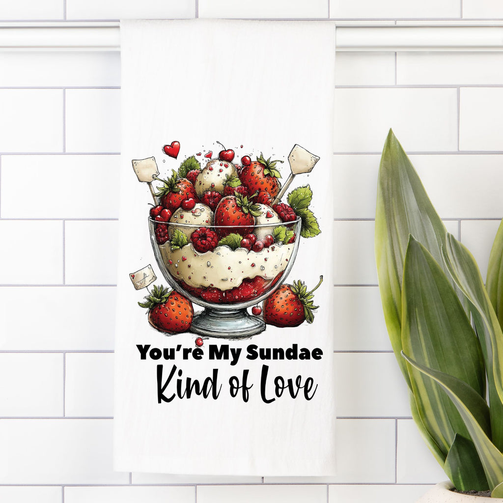 Tea towel with Fruit sundae illustration and 'You're My Sundae Kind of Love' text on a white tiled background.