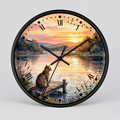 Round wall clock with a black frame and a scenic illustration of a cat sitting on a dock by a lake at sunset, with black Roman numerals and clock hands on a light gray background.