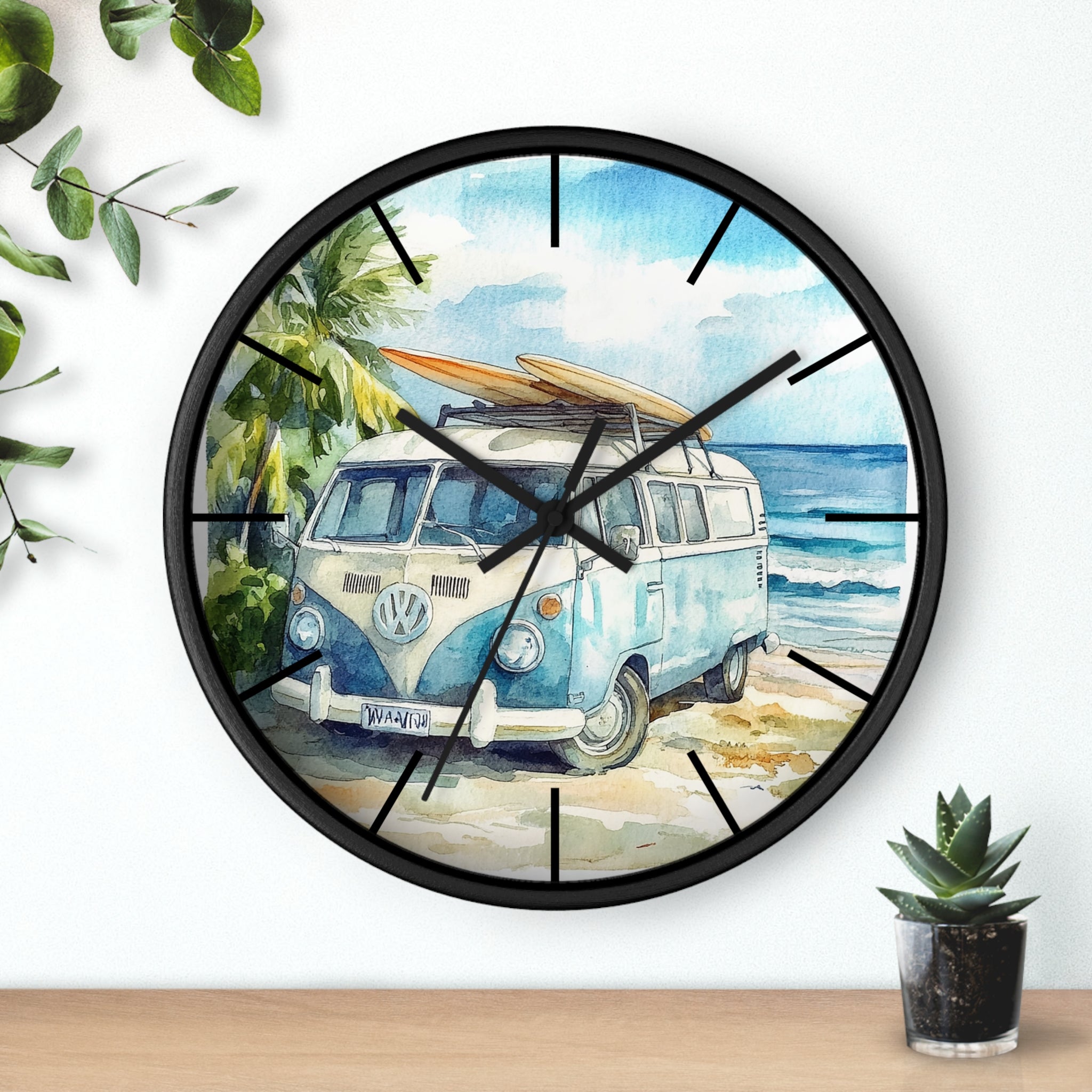 Wall clock with a beach scene featuring a van and surfboard, surrounded by greenery.