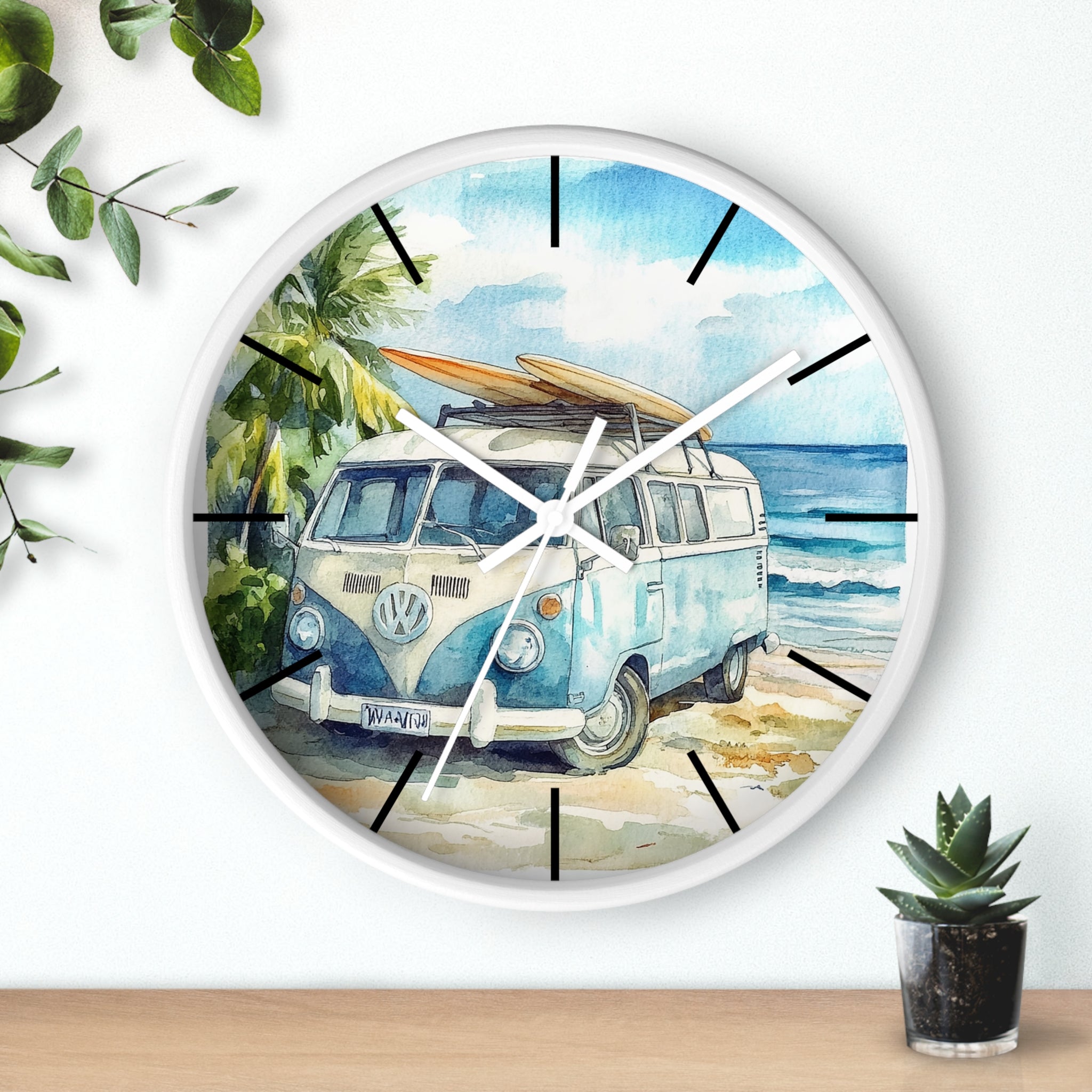 Wall clock with a beach scene featuring a Volkswagen van and surfboard, surrounded by greenery.