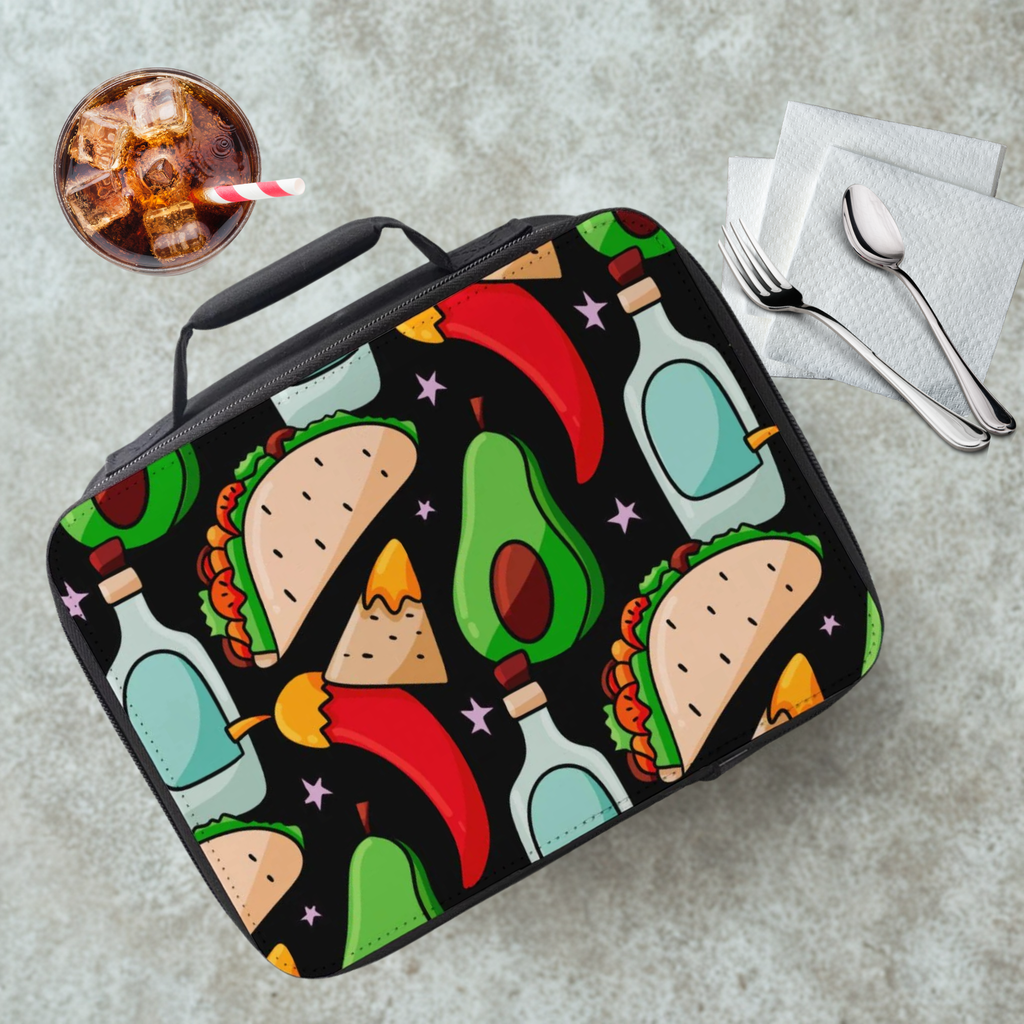 Lunch bag with colorful Mexican food pattern on a cafeteria table with a drink and utensils.