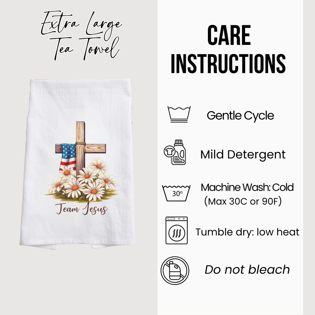 Tea towel with cross and flowers design and care instructions on a white background