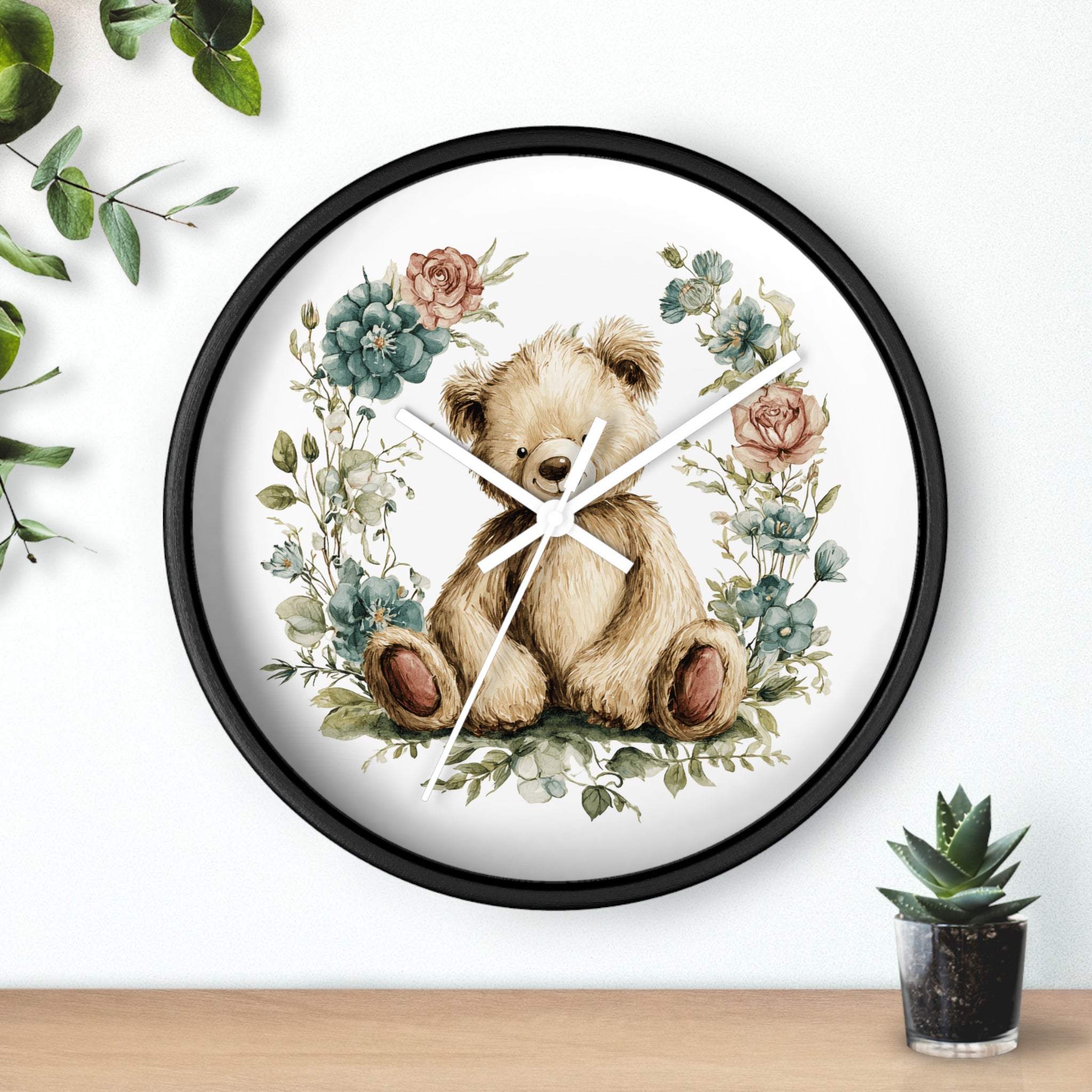 Wall clock with teddy bear and floral design on a white background