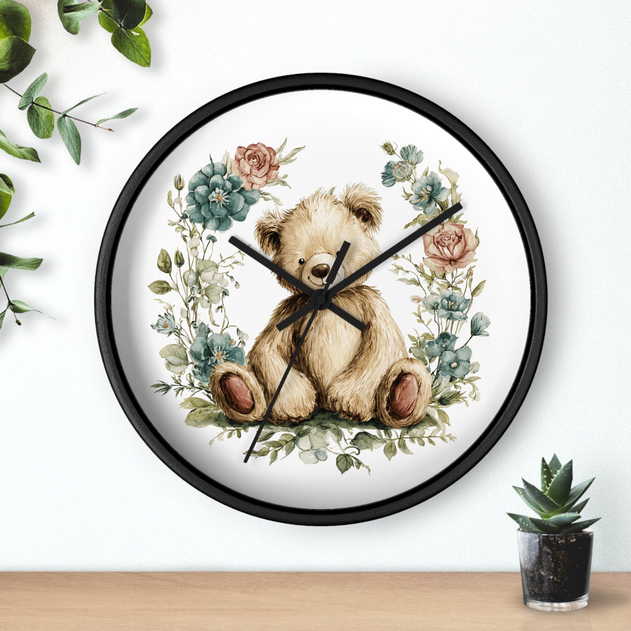 Wall clock with teddy bear and floral design on a white background