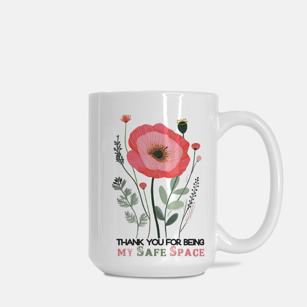 White 15oz. mug with a hand drawn pink flower design and text 'Thank You For Being My Safe Space' on a white background